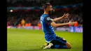 Pemain Tengah AS Monaco, Yannick Ferreira Carrasco melakukan selebrasi usai mencetak gol di laga 16 besar Liga Champions di Emirates Stadium, London, (25/2/2015). AS Monaco unggul 3-1 atas Arsenal. ( Reuters/John Sibley)