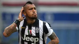 Arturo Vidal. Gelandang Cile berusia 34 tahun yang kini memasuki musim kedua bersama Inter Milan ini mampu menjadi top skor Juventus di Liga Italia yaitu musim 2012/2013. Ia mampu mencetak 10 gol di musim keduanya tersebut dari total 4 musim berseragam Juventus. (AFP/Marco Bertorello)