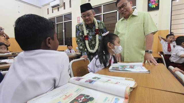 Prof Abdul Mu’ti dan Sofyan Tan