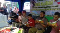 Kapolres Pelabuhan Tanjung Perak, Surabaya, Jatim, menggelar program Mengaji Satu Juz Dapat Hadiah Parsel. (Liputan6.co/Dhimas Prasaja)