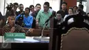Anak didik OC Kaligis, Afrian Bondjol memberikan kesaksian dalam sidang lanjutan terkait kasus suap anggota hakim dan panitera PTUN Medan dengan terdakwa OC Kaligis di Pengadilan Tipikor, Rabu (4/11). (Liputan6.com/Helmi Afandi)