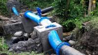 Instalasi Pengelolaan Air (IPA) senilai Rp8,8 miliar di Desa Helanlangowuyo, Kecamatan Adonara Timur, Kabupaten Flores Timur, NTT mubazir karena tak fungsional. (Foto: Istimewa-Ola Keda)