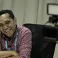 COO PT Liga Indonesia Baru (LIB), Tigor Shalom Boboy, saat jumpa pers di Kantor LIB, Jakarta, Selasa (6/3/2018). PT LIB telah melunasi sisa subsidi kepada 18 klub Liga 1 dengan total lebih dari Rp38 miliar. (Bola.com/M Iqbal Ichsan)