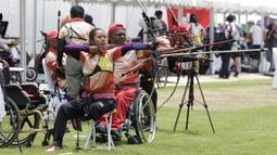 Atlet panahan Asian Para Games melakukan latihan di Lapangan Panahan, Senayan, Jakarta, kamis (04/10/2018). Latihan tersebut juga dalam rangka uji coba lapangan jelang pertandingan. (Bola.com/M Iqbal Ichsan)