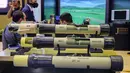 Tampilan sampel peluncur granat antitank genggam "Nashshab" RPG-32 buatan Rusia rakitan Yordania dipamerkan pada Pameran Pertahanan Maritim Internasional Doha atau Doha International Maritime Defense Exhibition (DIMDEX) di Doha, Qatar, 21 Maret 2022. (KARIM JAAFAR/AFP)