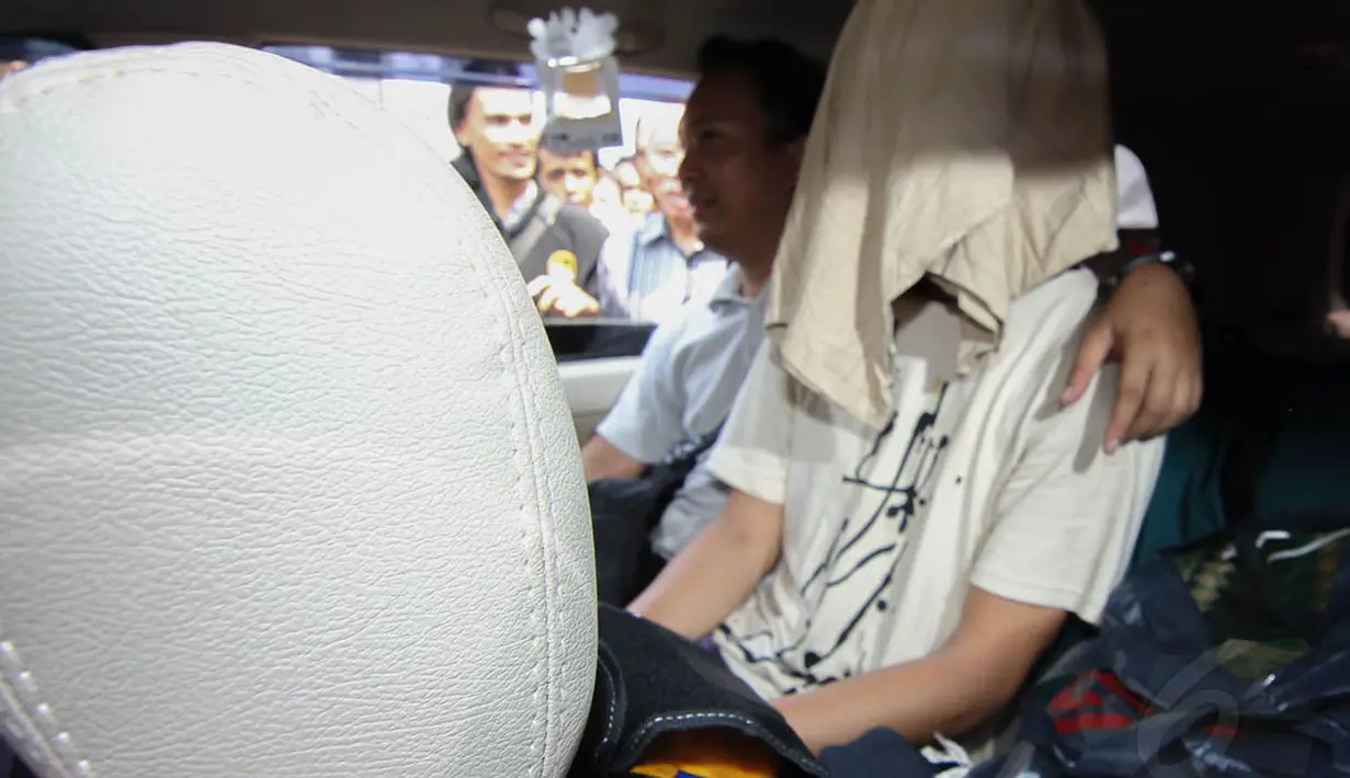 Diduga barang haram tersebut milik warga negara Hongkong berinisial LSC (45), kini sudah diamankan pihak Polda Metro Jaya, Rabu (30/4/14). (Liputan6.com/Faizal Fanani)