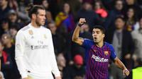Luis Suarez mencetak tiga gol ke gawang Real Madrid. (AFP/Gabriel Bouys)