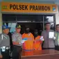 Pasutri yang mengaku anggota BIN saat terjaring dalam Operasi Zebra Semeru 2017 di Kecamatan Prambon, Sidoarjo, Jatim. (Liputan6.com/Dian Kurniawan)