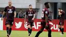 Pemain PSM Makassar tampak kecewa usai gagal lolos ke final Zona ASEAN Piala AFC 2019 meski menang atas Becamex Binh Duong di Stadion Pakansari, Rabu (26/6). PSM menang 2-1 atas Becamex Binh Duong. (Bola.com/M Iqbal Ichsan)