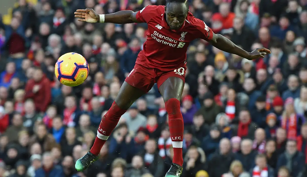 7. Sadio Mane (Liverpool) - 12 gol dan 1 assist (AFP/Paul Ellis)