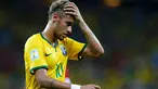 Ekspresi penyerang Brasil, Neymar, usai ditahan imbang Meksiko di penyisihan Piala Dunia 2014 Grup A, Estadio Castelao, Brasil, (18/6/2014). (REUTERS/Marcelo Del Pozo)