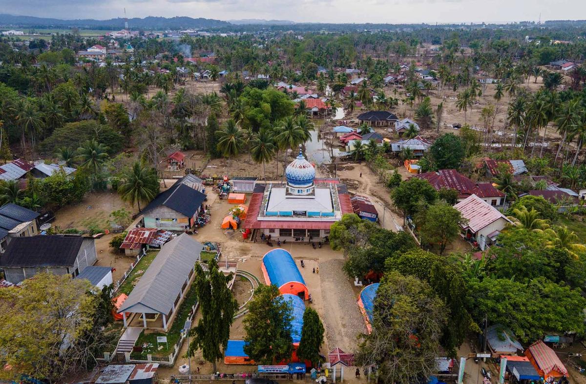 FOTO: Ramadan di Tengah Pengungsian Korban Banjir Aceh
