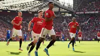 Striker Manchester United Marcus Rashford (kanan) merayakan golnya ke gawang Leicester City pada laga Liga Inggris di Stadion Old Trafford, Manchester, Inggris, Sabtu (14/9/2019). Gol tunggal Rashford membawa MU menang atas Leicester. (Oli SCARFF/AFP)