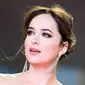 Dakota Johnson ingin mendengar kisah para perempuan yang telah mengalami pelecehan dan kekerasa seksual.(Filippo MONTEFORTE / AFP)