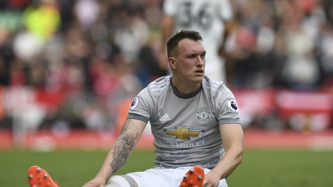 Bek Manchester United (MU), Phil Jones. (AFP/Paul Ellis)