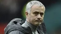 Jose Mourinho menyiratkan kalau Manchester United sulit untuk finis di posisi empat besar klasemen Premier League. (AFP/Oli Scarff)