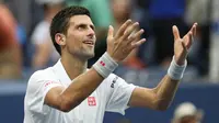 Ekspresi petenis Serbia, Novak Djokovic, seusai mengalahkan Gael  Monfils di semifinal AS Terbuka 2016, Sabtu (10/9/2016) pagi WIB. (EPA/Justin Lane)