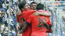 Selebrasi Lionel Messi bersama rekan-rekannya usai cetak gol kedua (REUTERS/Gustau Nacarino).