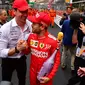 Toto Wolff bersama Sebastian Vettel. (AFP/Andrej Isakovic)