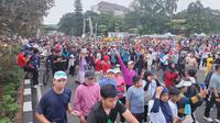Sejumlah warga menikmati car free day menggunakan Jalan Raya Margonda, Depok. (Liputan6.com/Dicky Agung prihanto)