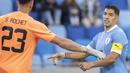 Luis Suarez. Striker Timnas Uruguay berusia 35 tahun yang baru saja mengikat kontrak jangka pendek dengan Nacional hingga akhir tahun 2022 ini menjadi salah satu pemain aktif dengan koleksi gol terbanyak di ajang Piala Dunia dengan 7 gol dari total 13 laga dalam 3 edisi Piala Dunia. Rinciannya adalah 3 gol dicetaknya pada Piala Dunia 2010 dan masing-masing 2 gol pada edisi 2014 dan 2018. (TASR via AP/Martin Baumann)