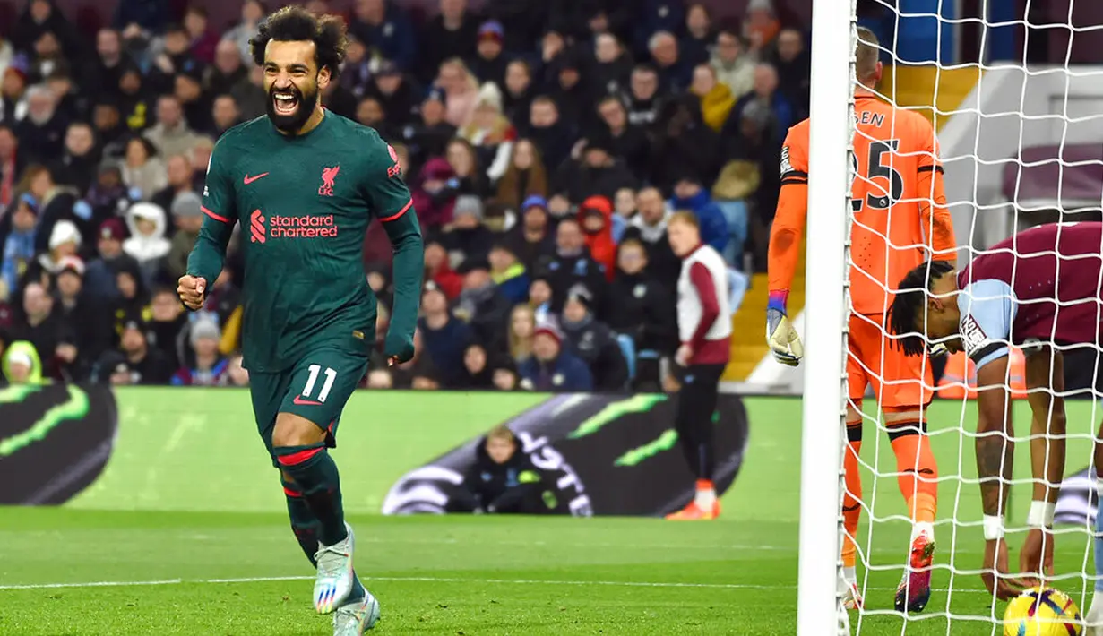 Pemain Liverpool Mohamed Salah melakukan selebrasi usai mencetak gol ke gawang Aston Villa pada pertandingan sepak bola Liga Inggris di Villa Park, Birmingham, Inggris, 26 Desember 2022. Liverpool mengalahkan Aston Villa dengan skor 3-1. (AP Photo/Rui Vieira)