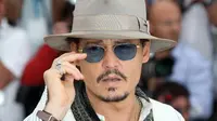 Johnny Depp menjadi salah satu sahabat yang membantu Angelina Jolie melewati masa perceraiannya dengan Brad Pitt. (AFP/Bintang.com)
