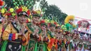 Aksi yang dimulai sekitar jam 06.00 pagi WIB itu berlangsung meriah. Warga pun antusias menyaksikan acara yang menampilkan ribuan pesilat serta penari tersebut. (Liputan6.com/Angga Yuniar)