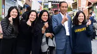 Presiden Joko Widodo atau Jokowi dan Iriana di Busan, Korea Selatan, Minggu (24/11/2019). (Foto: Laily Rachev - Biro Pers Sekretariat Presiden)