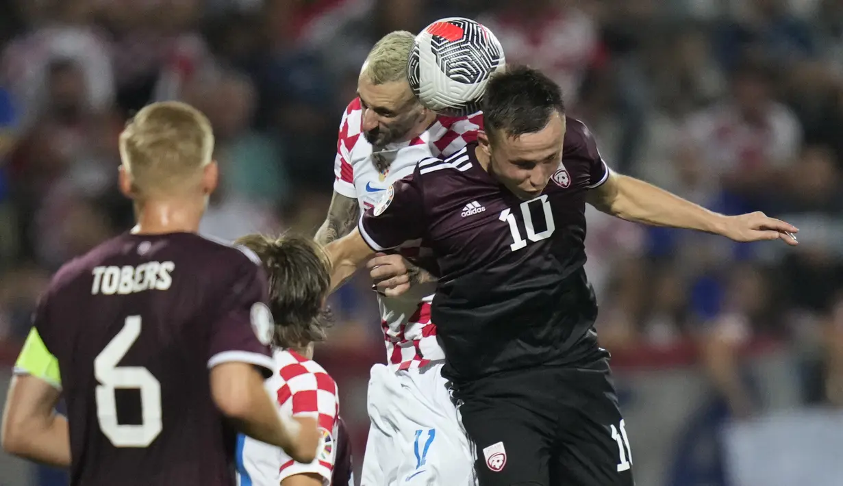 Krosia yang menang besar dengan skor 5-0 ketika menjamu Latvia. (AP Photo/Darko Bandic)
