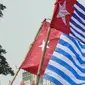 Direskrimum Polda Papua mengamankan 7 orang yang kedapatan mengibarkan Bendera Bintang Kejora di Jayapura Papua. (Liputan6.com/ Istimewa)