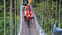 Wakil Gubernur Sumatera Utara (Wagub Sumut) Musa Rajekshah dan Pangdam I/ Bukit Barisan (BB) Mayjen TNI Achmad Daniel Chardin ikut meramaikan Bukit Lawang Orangutan Trail Run 2023