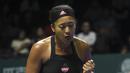 Di final Naomi mengalahkan Serena Williams dengan straight set. Hal tersebut menjadikan Naomi Osaka sebagai petenis wanita yang paling dicari di halaman google pada tahun 2018. (AFP/Roslan Rahman)