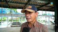 Kepala Dinas Perikanan dan Peternakan (Kadiskanak) Garut, Sofyan Yani memberikan penjelasan mengenai perkembangan penyakit mulut dan kuku di Garut, Jawa Barat. (Liputan6.com/Jayadi Supriadin)