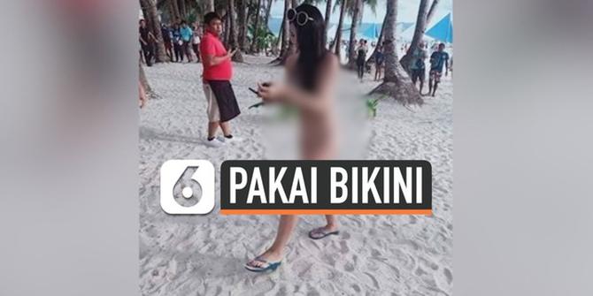 VIDEO: Turis Ditangkap karena Pakai Bikini di Pantai