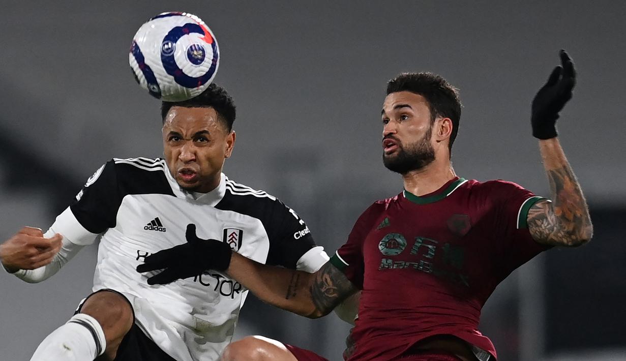 Hanya memperkuat Lyon satu kali pada musim 2020/2021, ia lantas hengkang ke Fulham masih di awal musim yang sama. Total telah memperkuat Fulham dalam 18 laga musim ini, hingga akhirnya Fulham harus terdegradasi di akhir musim. (AFP/Glyn Kirk/Pool)