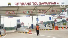 Suasana sosialisasi pembukaan jalan tol Desari Seksi II di kawasan Sawangan, Depok, Jawa Barat, Jumat (3/7/2020). Tol sepanjang 6,3 km tersebut mulai bisa dilalui kendaraan dengan tarif Rp0 alias gratis untuk dua minggu kedepan. (Liputan6.com/Immanuel Antonius)
