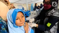 Dan untuk mempercepat pencapaian target eliminasi kanker serviks, program imunisasi HPV mulai dilaksanakan secara nasional pada tahun 2023. (merdeka.com/Arie Basuki)