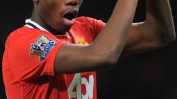 Pada awal kemunculannya bersama tim senior Manchester United tahun 2012, gaya rambut Paul Pogba masih biasa saja. (AFP/Andrew Yates)