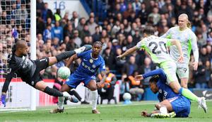 Manchester City berhasil memetik kemenangan saat bertandang ke markas Chelsea dalam laga lanjutan Liga Inggris 2025/2026 di Stamford Bridge, Londong, Inggris, Minggu (12/04/2026). (AP Photo/Ian Walton)