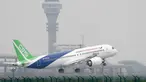 Pesawat penumpang jet C919 buatan China lepas landas pada penerbangan perdananya di Bandara Internasional Pudong, Shanghai, Jumat (5/5). Pesawat tersebut menandai masuknya industri penerbangan China ke dalam kancah internasional (AP Photo/Andy Wong, Pool)