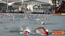 Citizen6, Surabaya: Dengan kekuatan sembilan tim dan masing-masing empat atlet serta tiga orang dinomor perorangan, Kormar mendonimasi di tiga etape lomba triathlon. (Pengirim: Penkobangdikal)