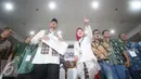 Agus Harimurti Yudhoyono dan Sylviana Murni usai mendaftar ke KPUD Jakarta sebagai pasangan Cagub dan Cawagub DKI Jakarta 2017, Jumat (23/9). Agus dan Sylviana diusung oleh Partai Demokrat, PKB, PPP, dan PAN.(Liputan6.com/Immanuel Antonius)