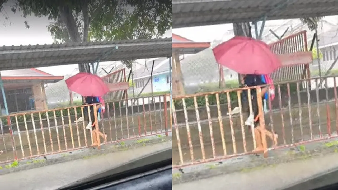 Aksi Siswi Gendong Teman Penyandang Autisme di Tengah Hujan