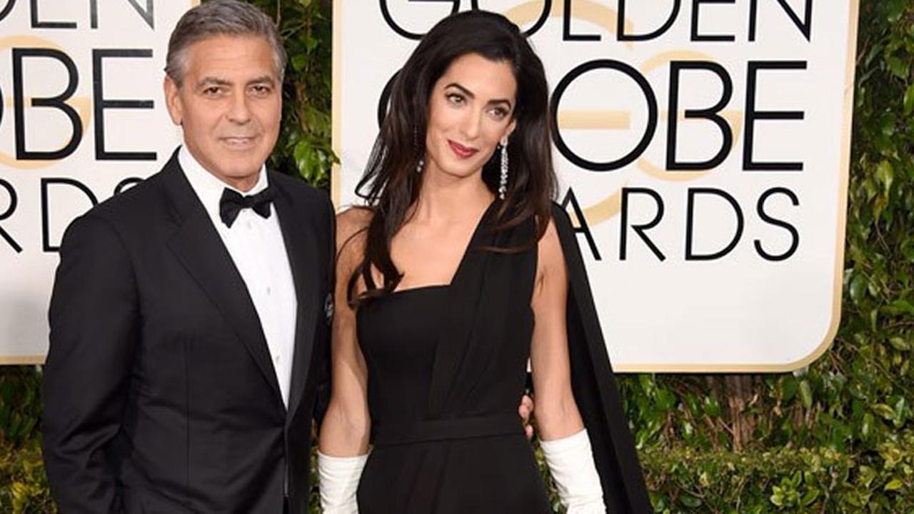 George Clooney gandeng mesra sang istri di acara Golden Globe Awards 2015