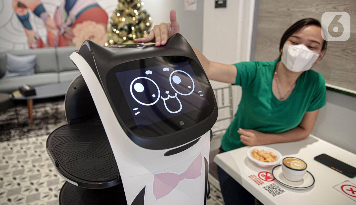 Tampilan layar pada robot pelayan saat dielus pelanggan usai mengantar pesanan di Rasa Koffie, Pasar Baru, Jakarta, Kamis (13/1/2022). Robot tersebut telah diprogram sesuai dengan meja yang tersedia. (Liputan6.com/Faizal Fanani)