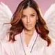 Tasya Farasya tampil bak Victoria's Secret Angel dengan sayap bulu putih dan bath robe bergaris pink-putih berlis hitam. Ia menyebut supermodel Adriana Lima menjadi inspirasi makeup look-nya, yaitu glam nude pink dengan kulit glowy dan bibir glossy yang menawan. [@tasyafarasya]