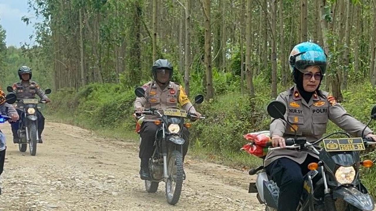 Polres Kampar Gelar Cooling System dan Bagi-Bagi Sembako di Desa Terisolir