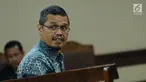 Terdakwa dugaan suap proyek pembangunan jalan di Kementerian PUPR, Yudi Widiana mengikuti sidang lanjutan di Pengadilan Tipikor, Jakarta, Rabu (7/3). Sidang politisi PKS itu mendengarkan nota pembelaan terdakwa. (Liputan6.com/Helmi Fithriansyah)