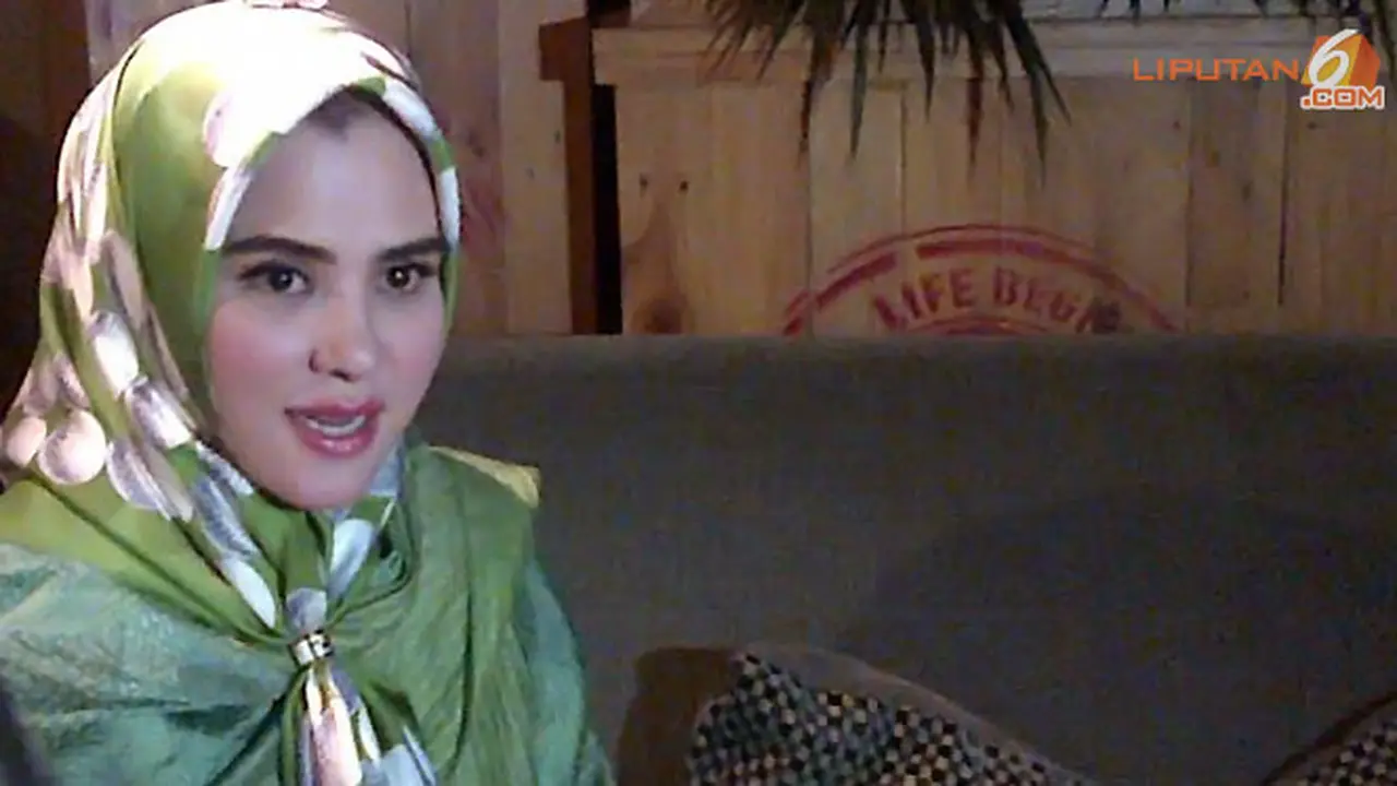 angel-lelga-punya-anak-140214c.jpg